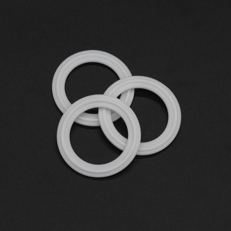 1.5 inch Tri-Clamp White Teflon Gasket. Group View. Photo Credit: TCfittings.com