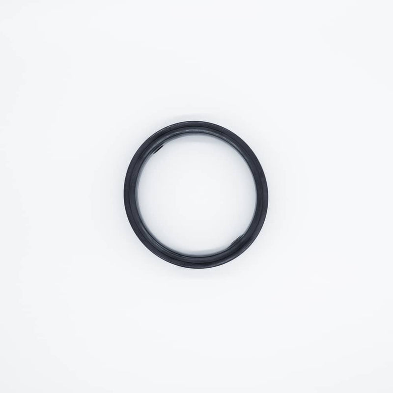 Black EPDM seat replacement seal for a four inch butterfly valve. Top view to display the inner and outer diameter. Photo Credit: TCfittings.com